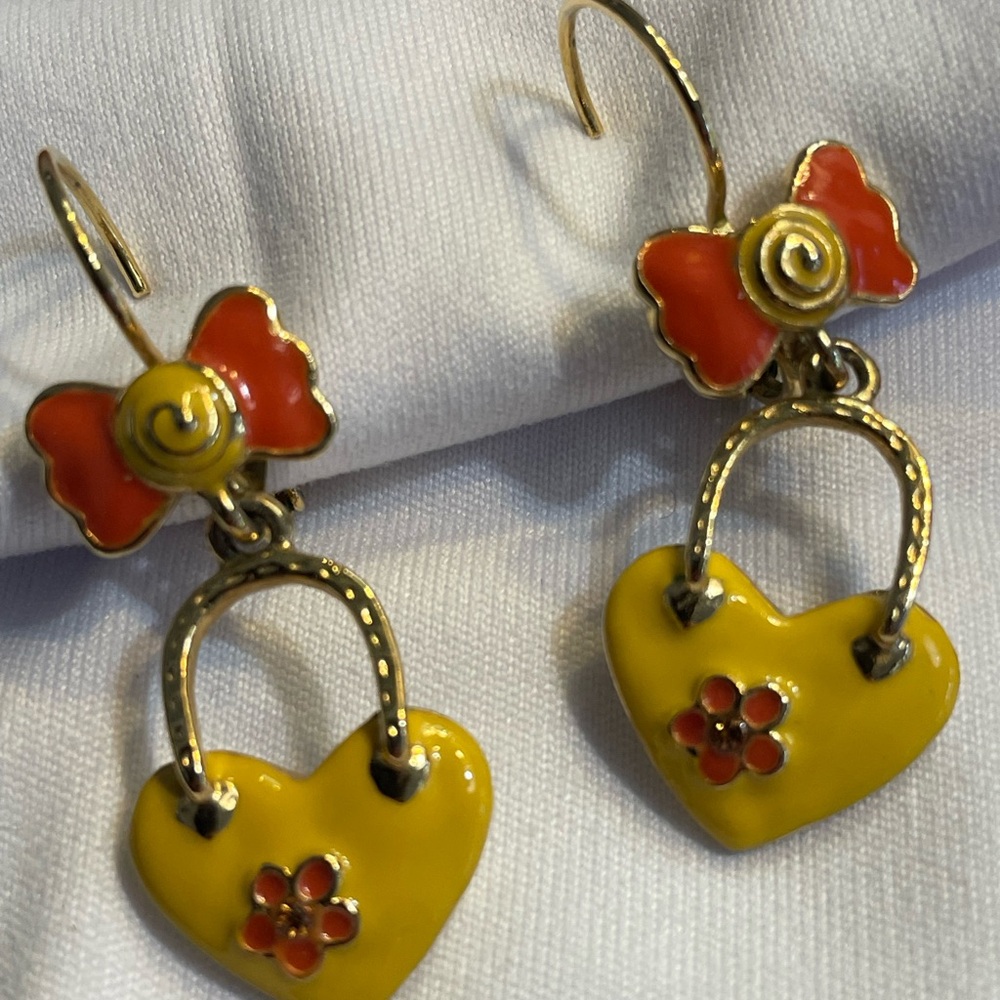 Earrings - Enameled Locket Heart with flower & topped with bow. Gold trim.